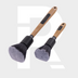 Two Soft Interior Brush Set makeup brushes with light brown handles and superzachte haren are placed diagonally on a light gray background featuring a large, faint white letter R.