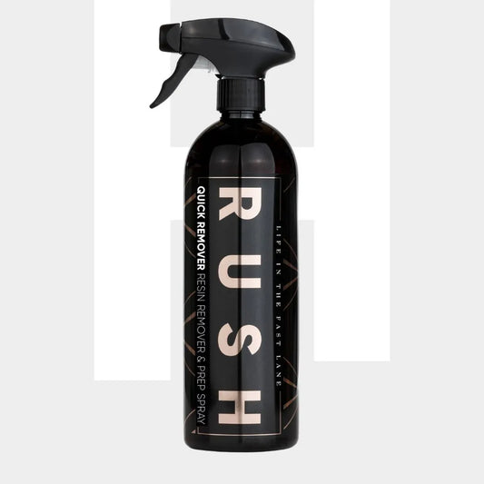 A black spray bottle labeled Quick Remover, described as an effective autolak reiniger and prep spray, is shown against a light background.