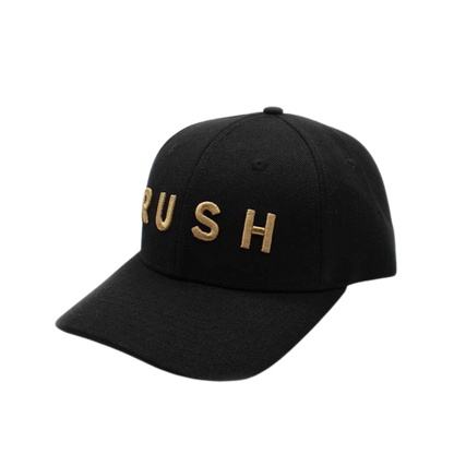 The RUSH Baseball Cap is a stylish, adjustable black cap featuring "RUSH" in bold gold lettering on the front, perfect for those living life in the fast lane. Displayed against a plain white background.