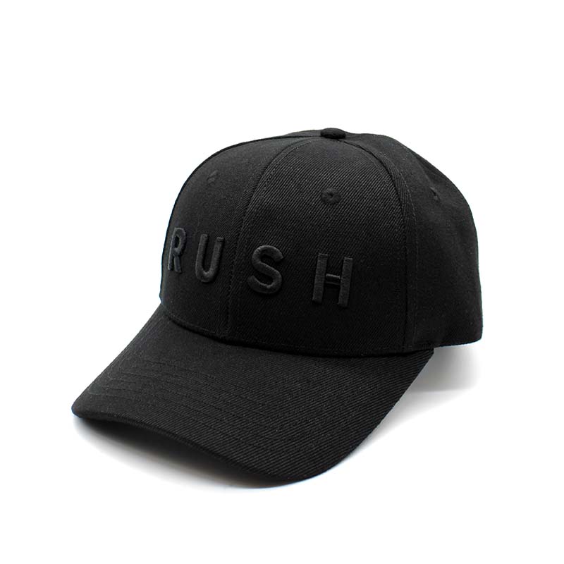The RUSH Baseball Cap is a black adjustable cap with "RUSH" in raised black letters on the front, pictured on a white background. Perfect for anyone who lives life in the fast lane.